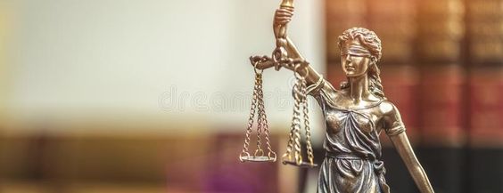 Where was the concept of 'Lady Justice' statue taken from?